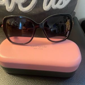 Kate spade sunglasses. Big round frames. Brown with flower sides